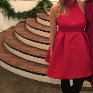 Red “Mustard Seed” halter dress.